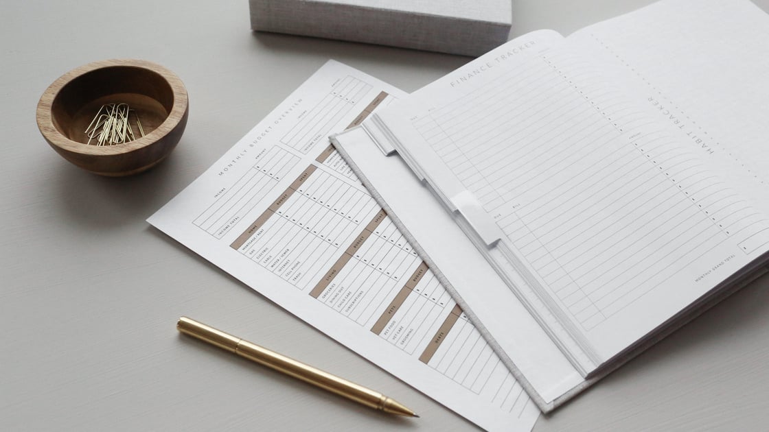 Papers and pen on desk